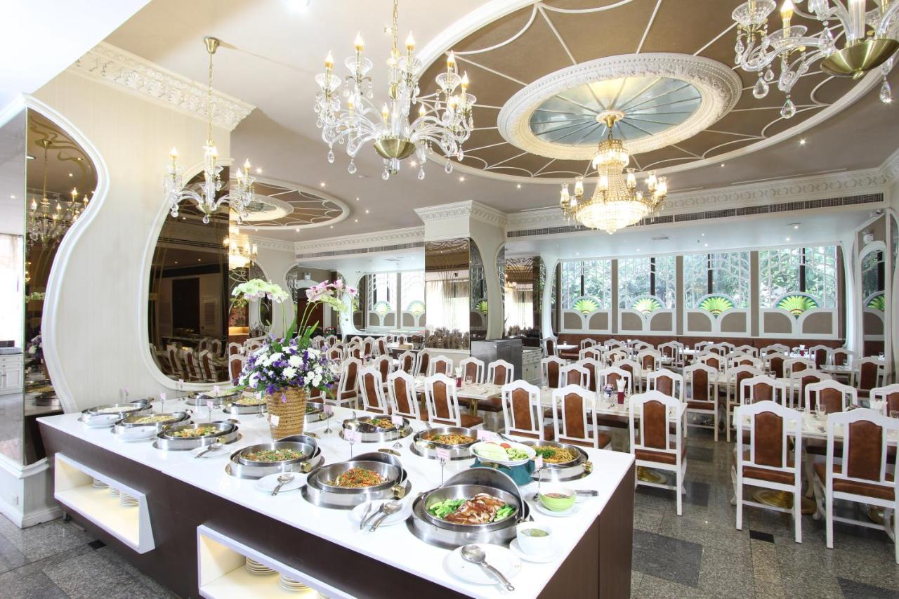 فندق رويال بينجا بانكوك المظهر الخارجي الصورة The interior of the restaurant